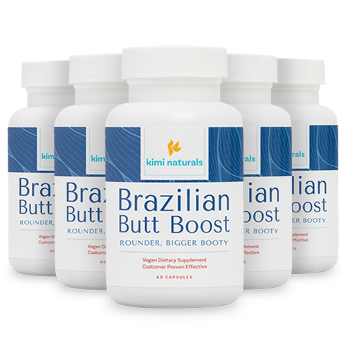 Six bottles of 'Breast Max Plus' dietary supplement with white and orange labels.
